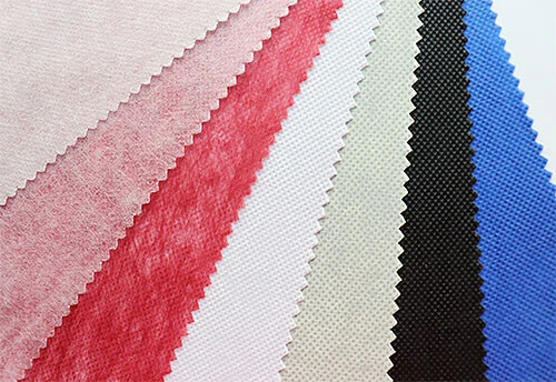 Close-up of spunbonded polyester fibers, highlighting their strength and suitability for industrial applications like filtration and insulation.